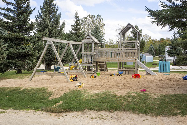 Playground fort and swings